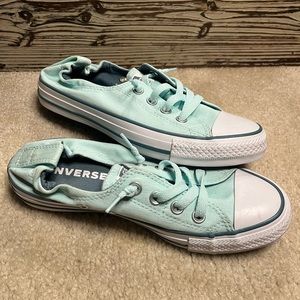 Mint green slip on converse